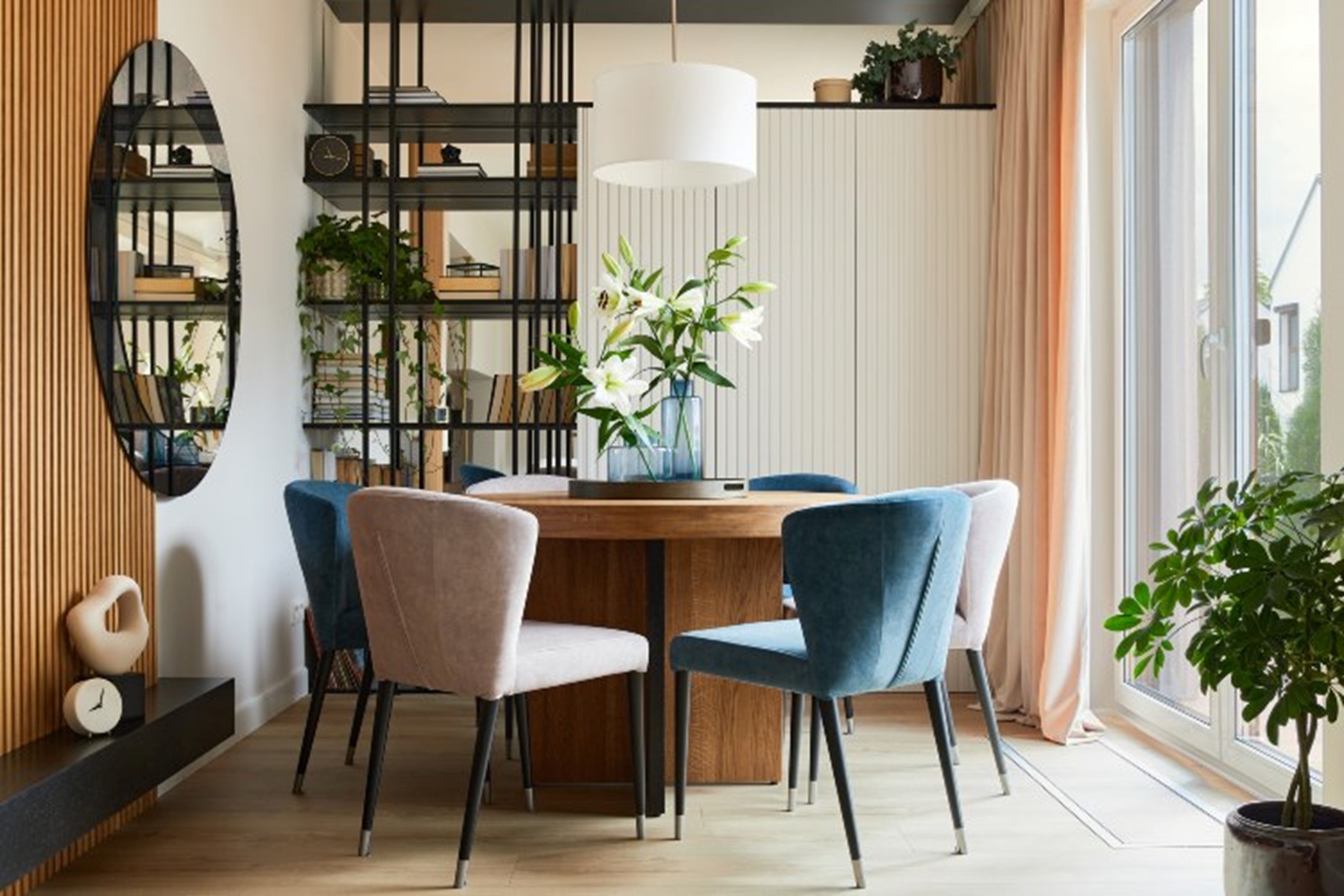 Elegant dining room with velvet armchairs and round table